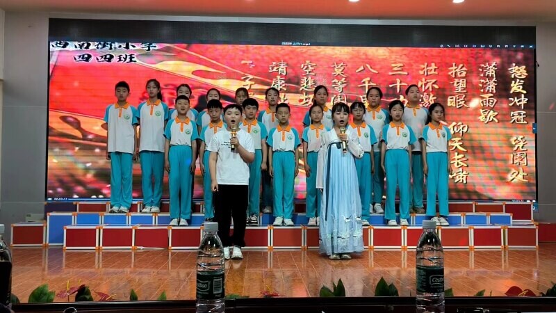 節氣吟風雅經典頌華章——西南街小學成功舉辦第三屆讀書節誦讀展示活動(圖4)